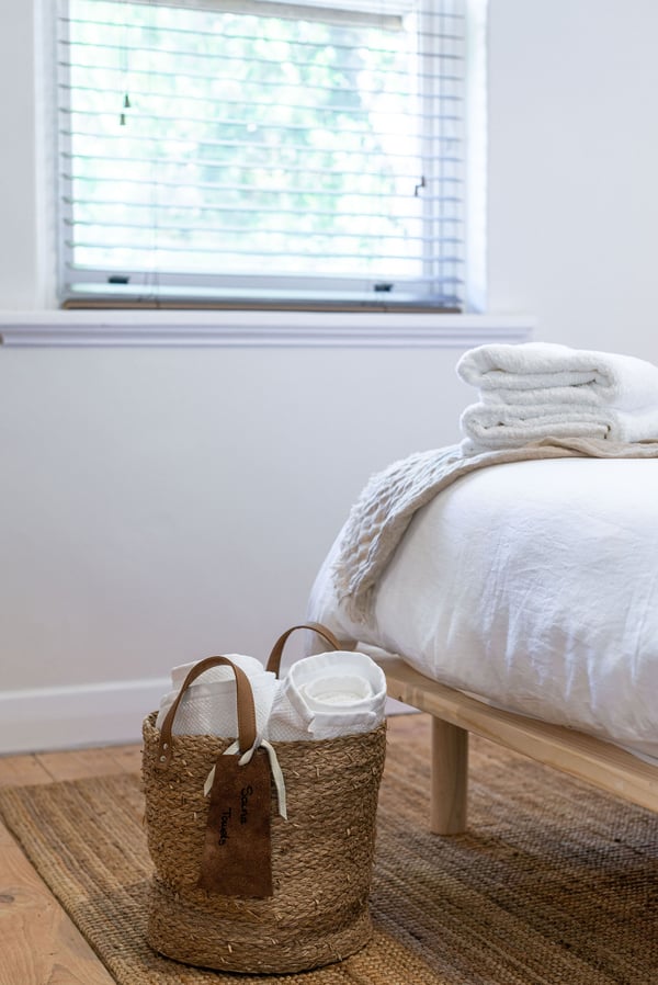 Hotel-quality towels and amenities styled for a romantic couple’s getaway
